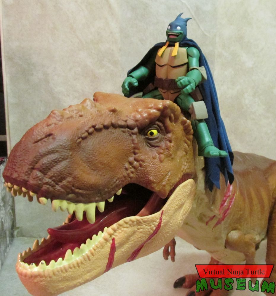 Mikey as Batman on a dino