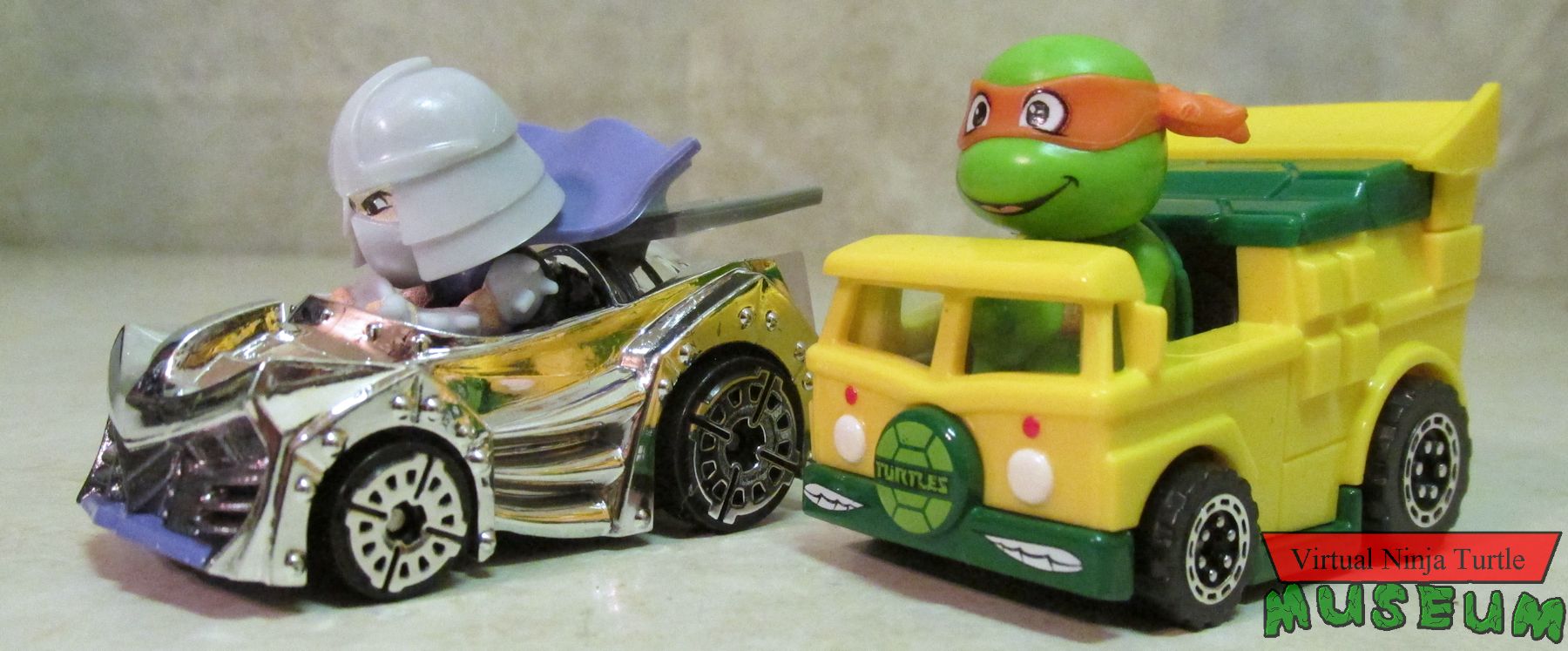 Racer Verse Michelangelo and Shredder